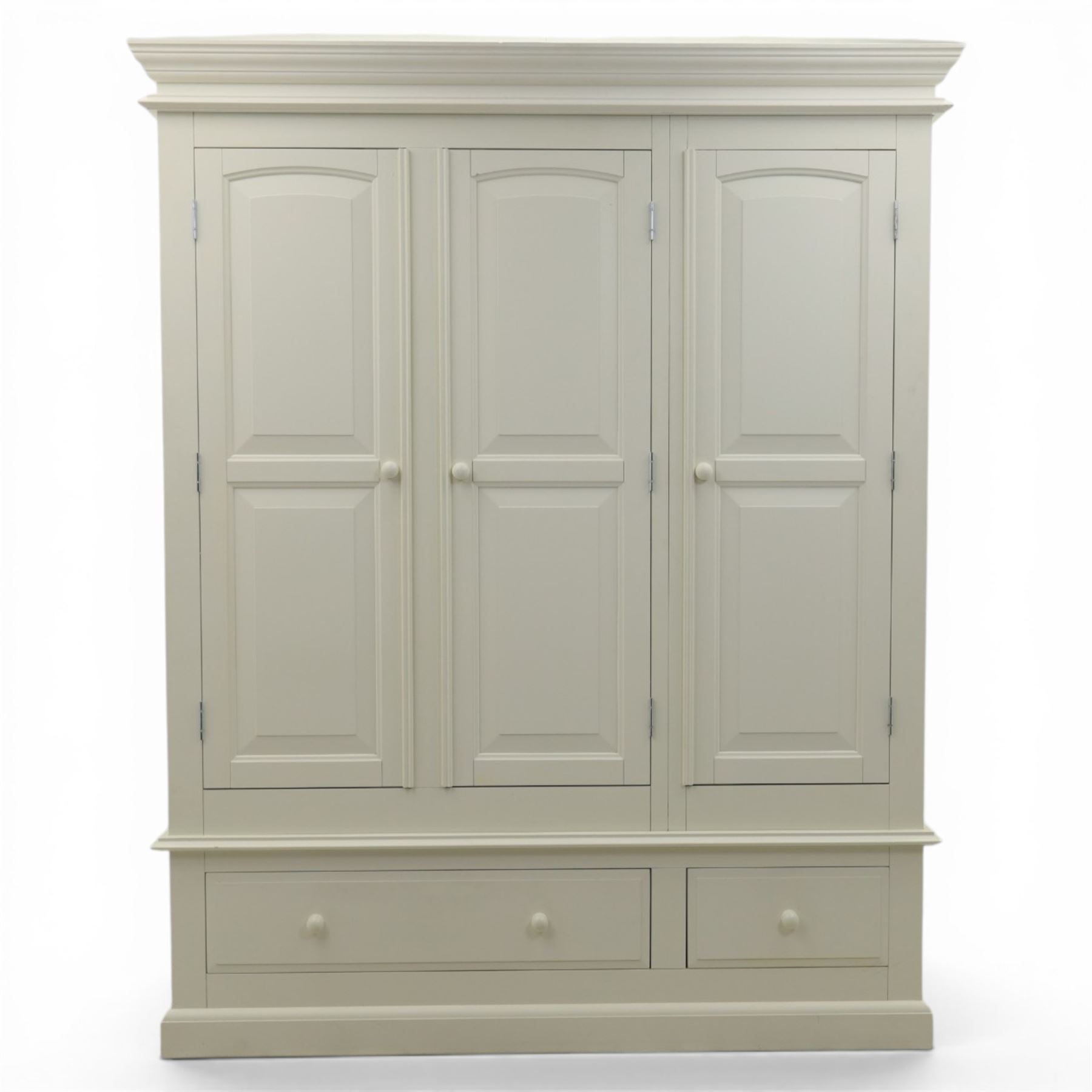 Modern white three door wardrobe, with two hanging section and shelving area, above a long drawer and a short drawer to the base, raised on a moulded plinth