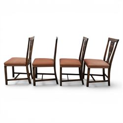 Set of eight George III dining chairs with padded seats, pierced vasiform splat, upholstered seat with brass trim, on square supports with H-stretcher