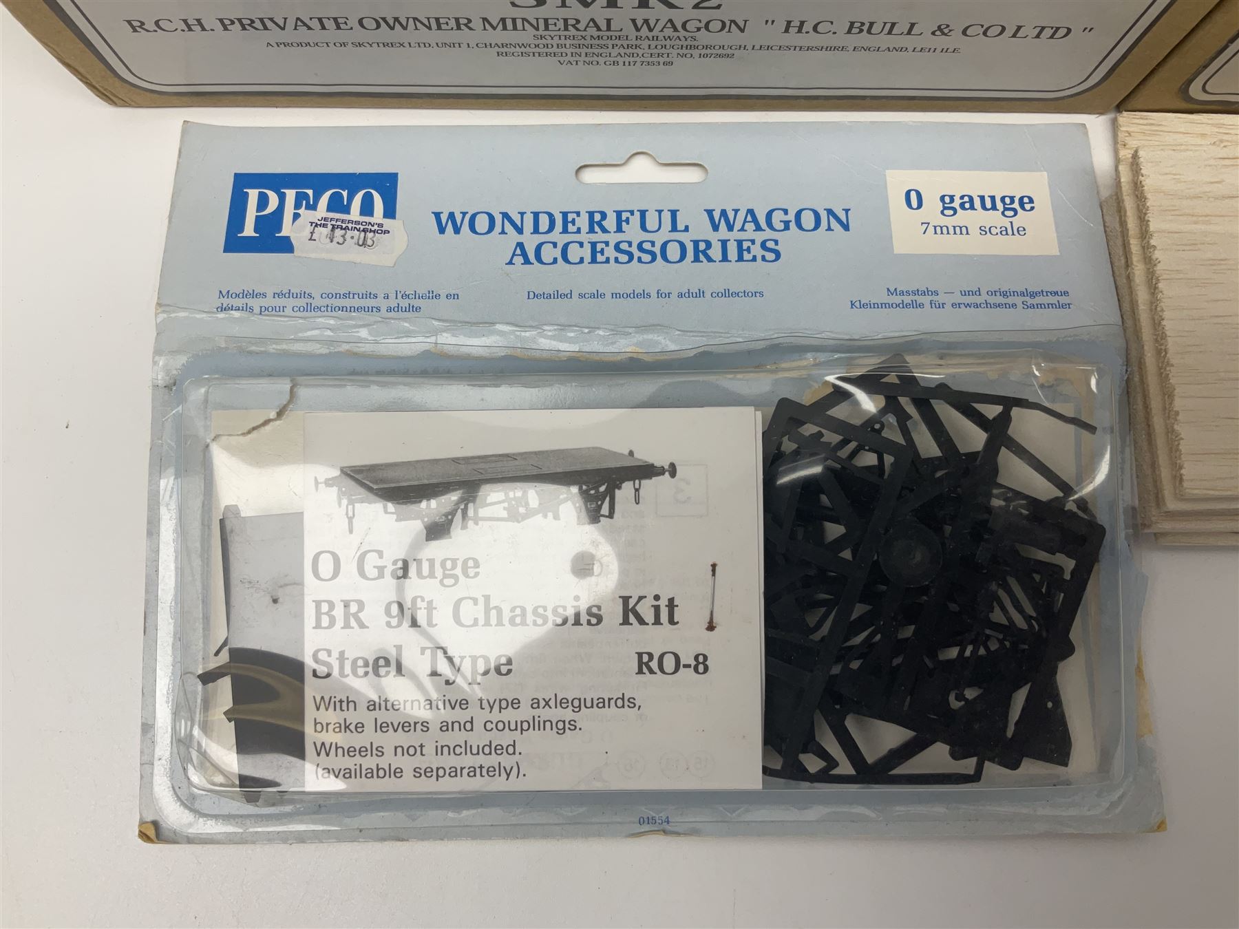 '0' gauge - two Finescale Wagons by Skytrex, SMR2 kit-built and painted for H.C. Bull & Co Ltd; both boxed; and Peco unmade wagon kit in opened packaging (3)