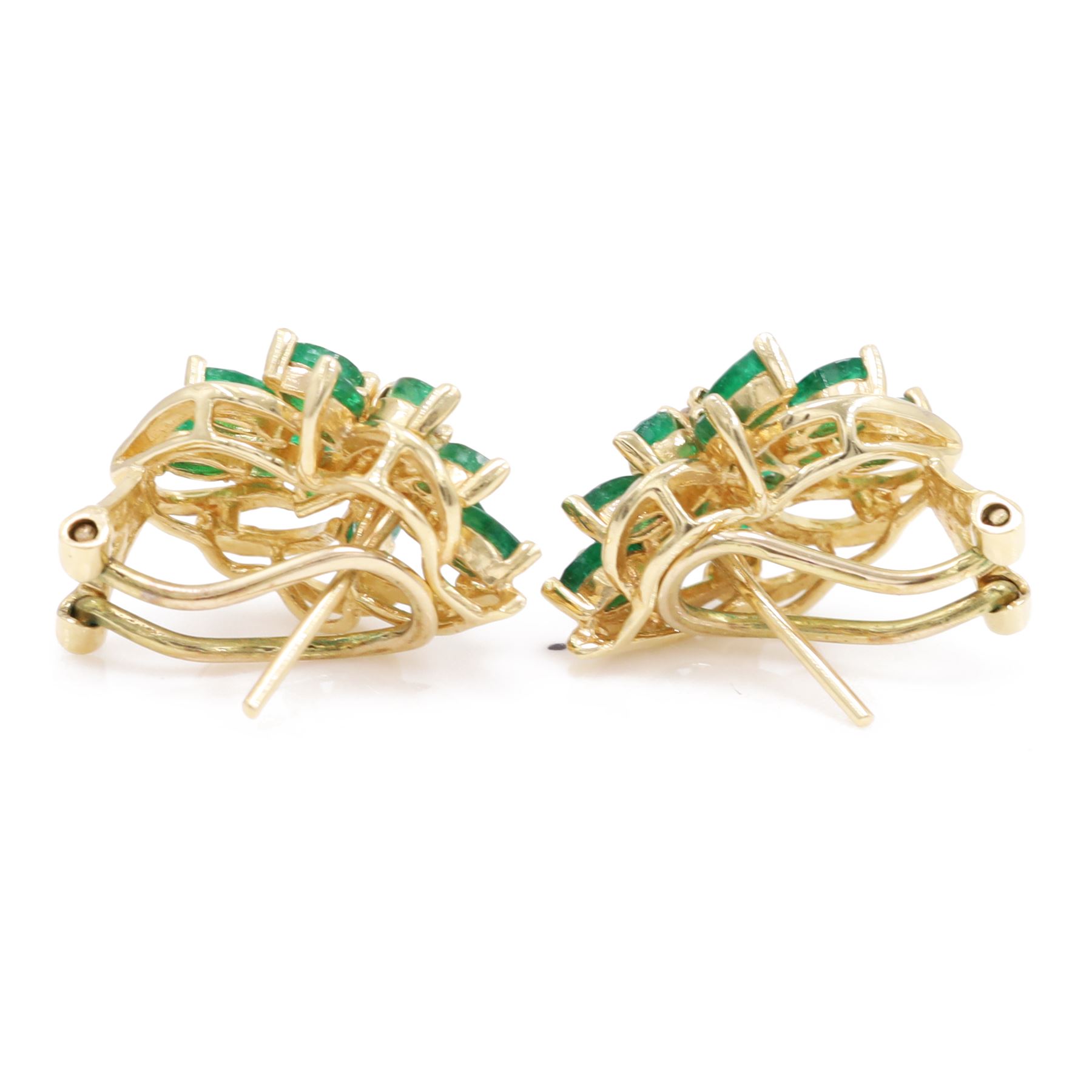 Pair of 14ct gold emerald and diamond cluster earrings, each stud set with twelve marquise cut emeralds and three round brilliant cut diamonds, stamped 585