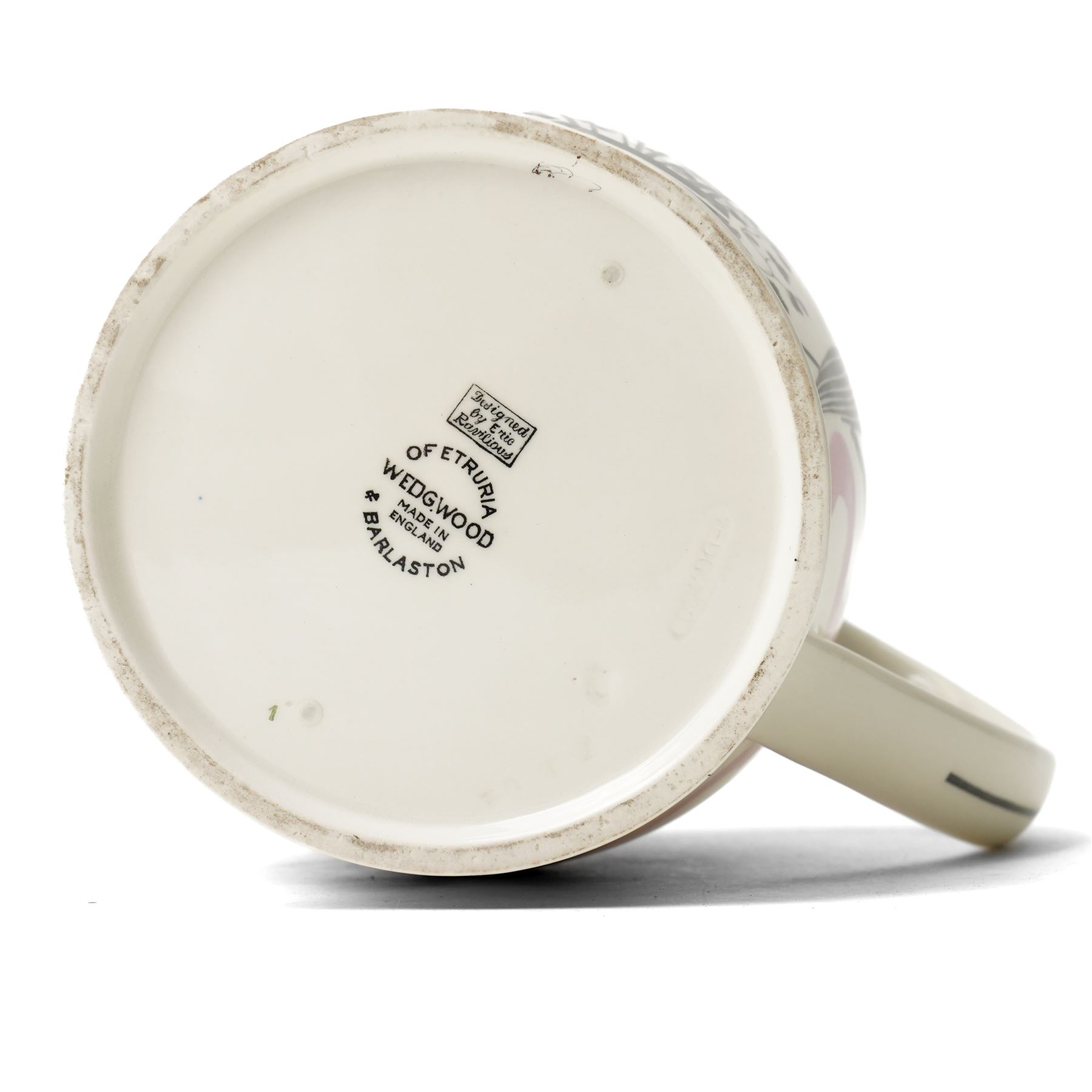 Eric Ravilious (British 1903-1942) for Wedgwood, a 'Garden Implements' Queen's ware jug with transfer printing, hand painting and lustre, printed and impressed marks to base, H20cm