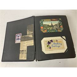 Postcard album with Victorian and later postcards, including silk cards, landscapes of the UK, portraits, Christmas cards etc  