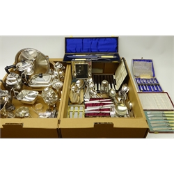  Matched four piece silver-plated tea set, Simpson H.M. & Co ornate silver-plated part tea set, set six silver handled butter knives, sugar sifter, Victorian carving set, 19th century and later sugar tongs, flatware and other silver plate in two boxes  