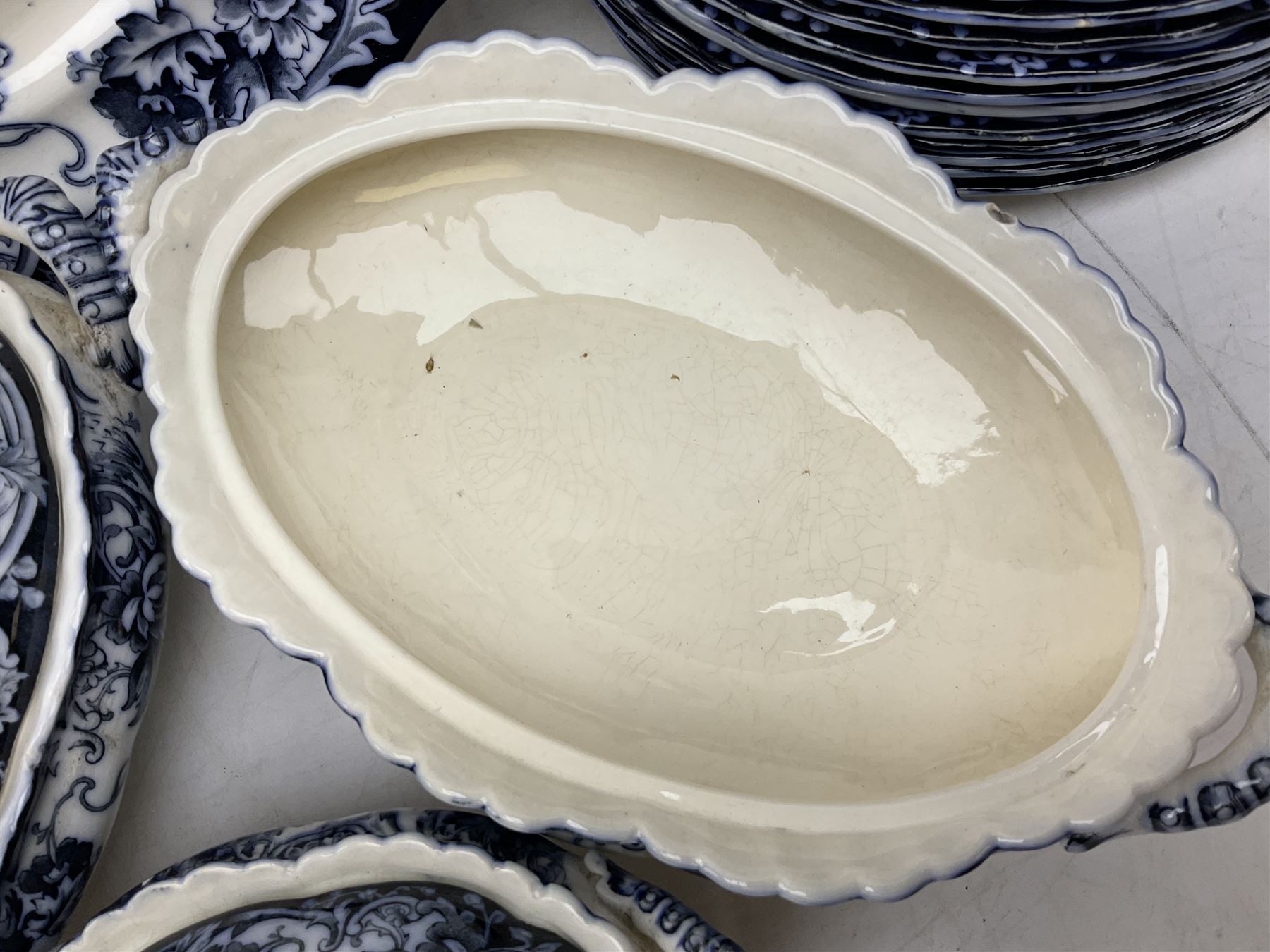 Late Victorian blue and white Chatsworth K Mayers & Co dinner wares, to include four lidded tureens, ladle, nine dinner plates, meat plate etc