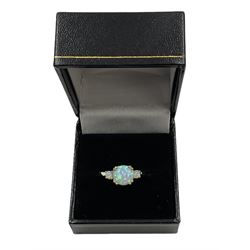 Silver-gilt three stone opal ring, stamped 925