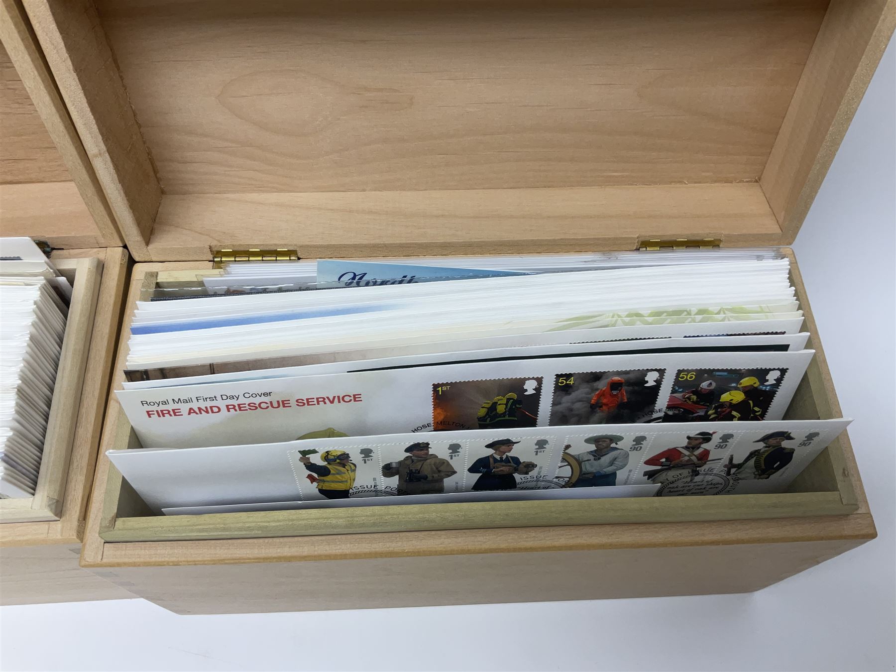 Coins and stamps, including The Royal Mint Great Britain 1970 coin set in plastic holder, 2006 'Brunel' coin cover containing two commemorative two pound coins, Alderney 2006 sterling silver proof five pounds, two 2007 five pound coins in card folders, two limited edition mint first class stamp sheets each comprised of ten first class stamps, various first day covers many with special postmarks housed in 'Royal Mail' boxes etc