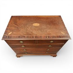 George III crossbanded mahogany chest, rectangular top with crossbanded edge and oval satinwood medallion, two short over three long graduated drawers with brass swan neck handles, raised on shaped bracket feet