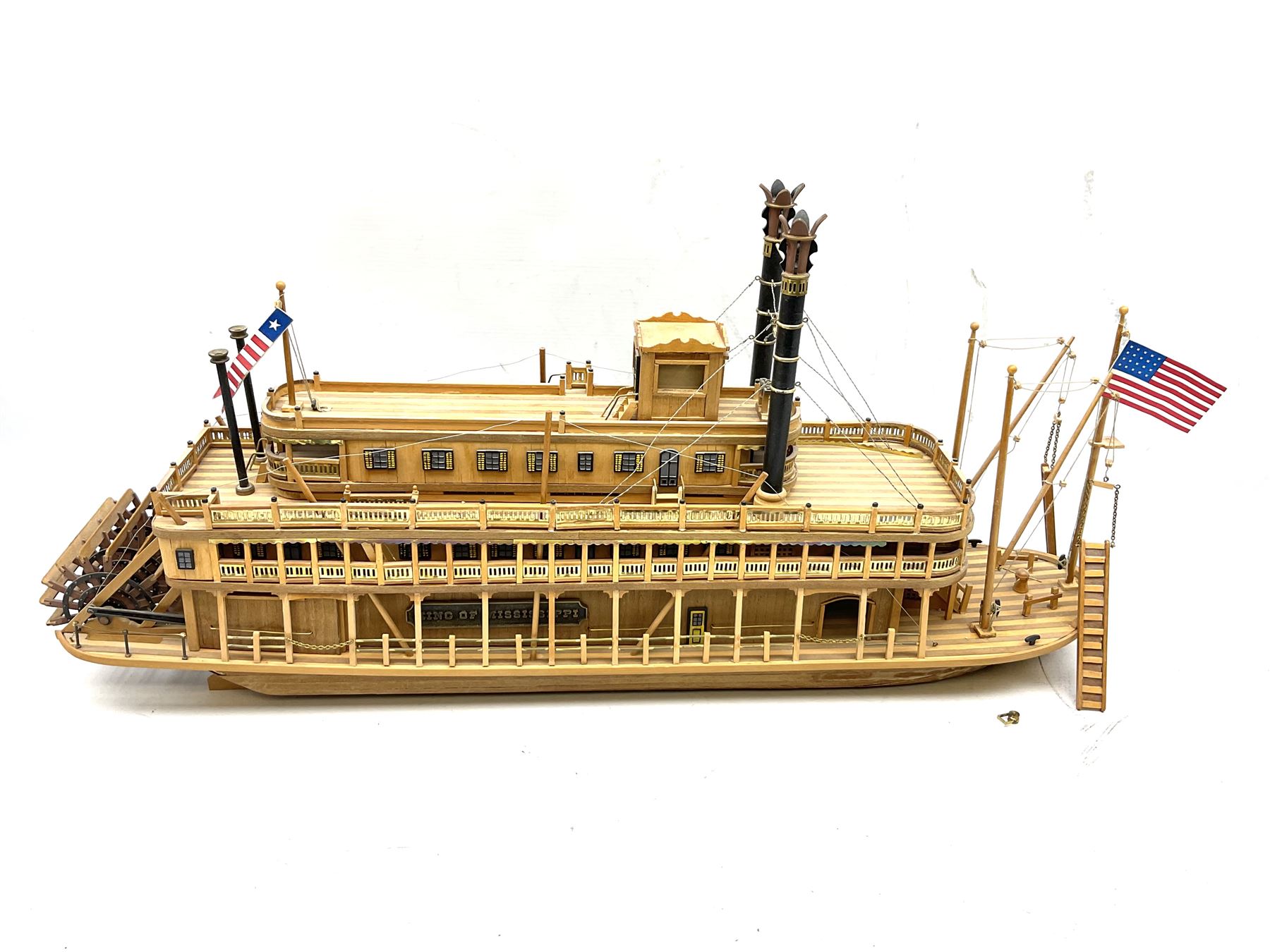 Hand built model of a river paddle steamer 'King of the Mississippi' and a sailing ship with three masts and unfurled sails, largest example H80cm, L101cm