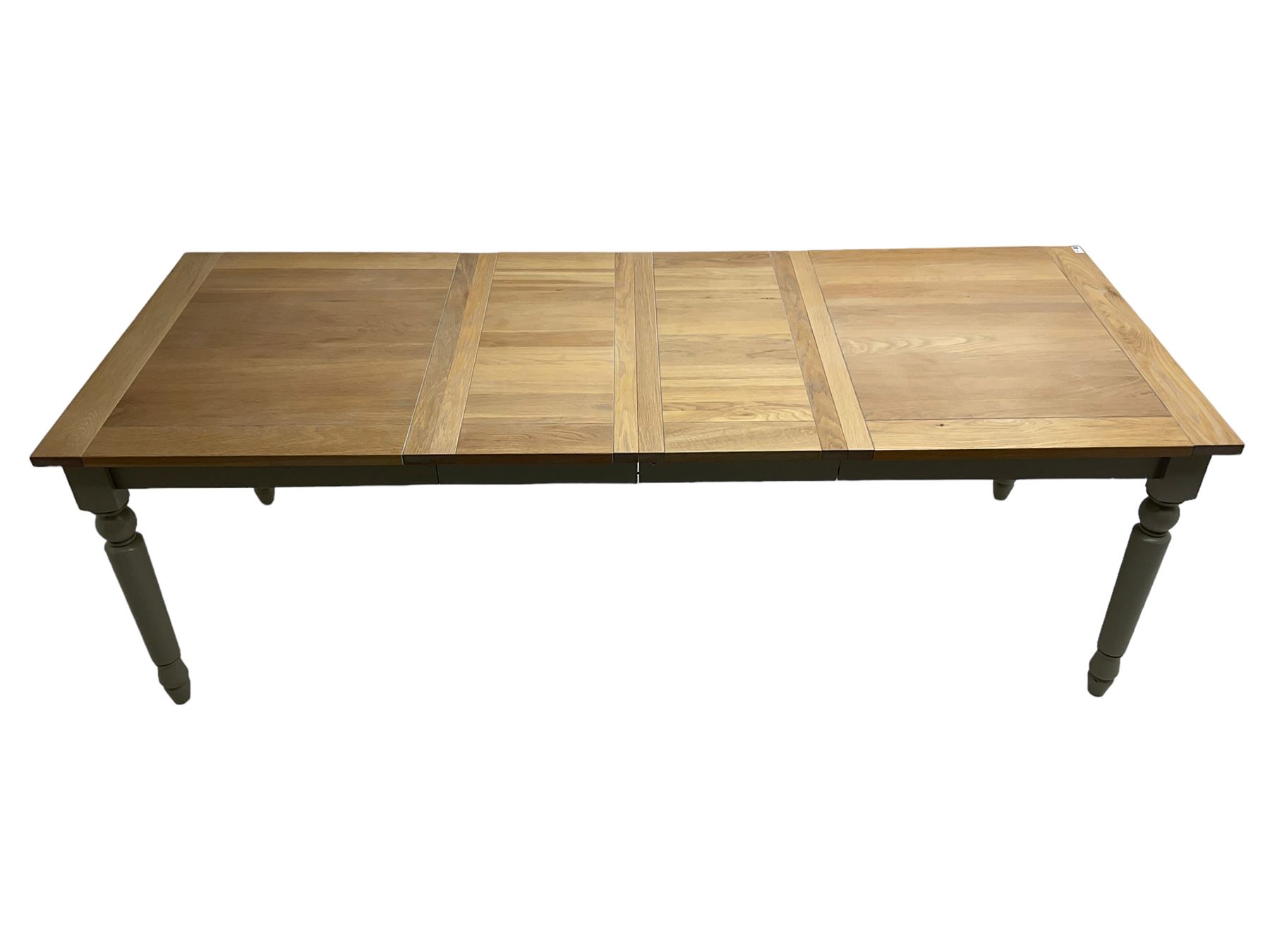 Neptune Furniture - 'Suffolk' oak dining table, pull-out extending top with two additional leaves, on turned supports, in grey paint and wax finish 