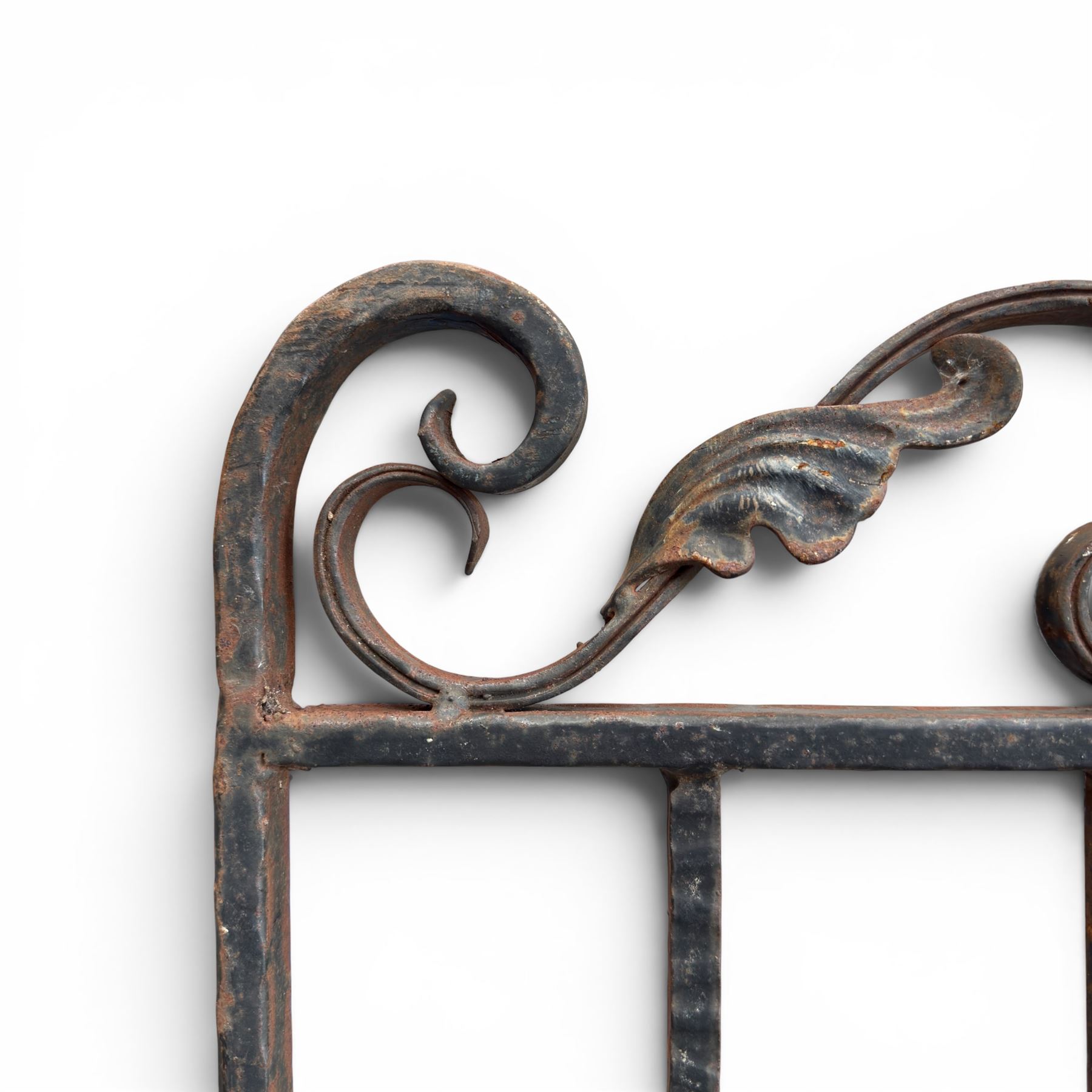 Victorian wrought iron vineyard gate, with ornate scrollwork and foliate acanthus leaf decoration, shaped cresting and central decorative panel, finished in rustic black painted finish