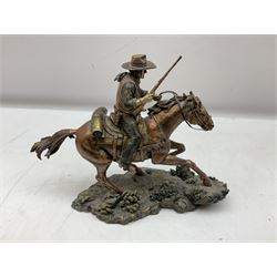 The Bradford Exchange John Wayne bowie decorative knife, L27cm and John Wayne Tall in the Saddle Galloping Thunder figure group