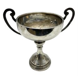 Small silver trophy, with twin handles and weighted base by William Adams Ltd, hallmarked Birmingham 1936, H12cm