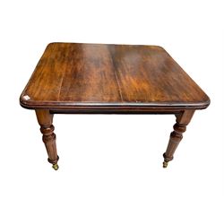 19th century mahogany extending dining table, moulded rectangular top with rounded corners, on turned and fluted supports with brass and ceramic castors
