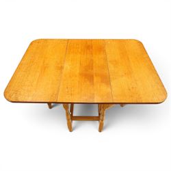 Beaverman - 1980s adzed oak drop-leaf dining table with gate-leg action, adzed top and leaves extending to 129cm, octagonal supports with large Beaver carving, by Colin Almack of Sutton near Thirsk 