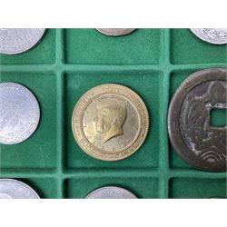 Coins and medallions including, York 1811 one shilling cattle and barber silver token, United States of America 1883O silver Morgan dollar, birds of destiny medal by Malcolm Appleby, Great British King George V 1930 halfcrown, King Edward VII 1902 silver medal, King George V 1916 halfcrown etc, housed in a case with lift out green coin trays