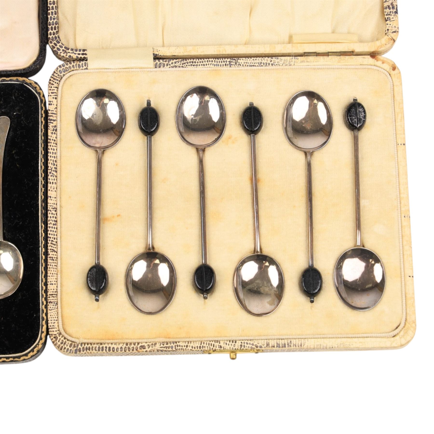 Set of six silver coffee bean spoon and a set of five silver coffee spoons, all hallmarked, in fitted case