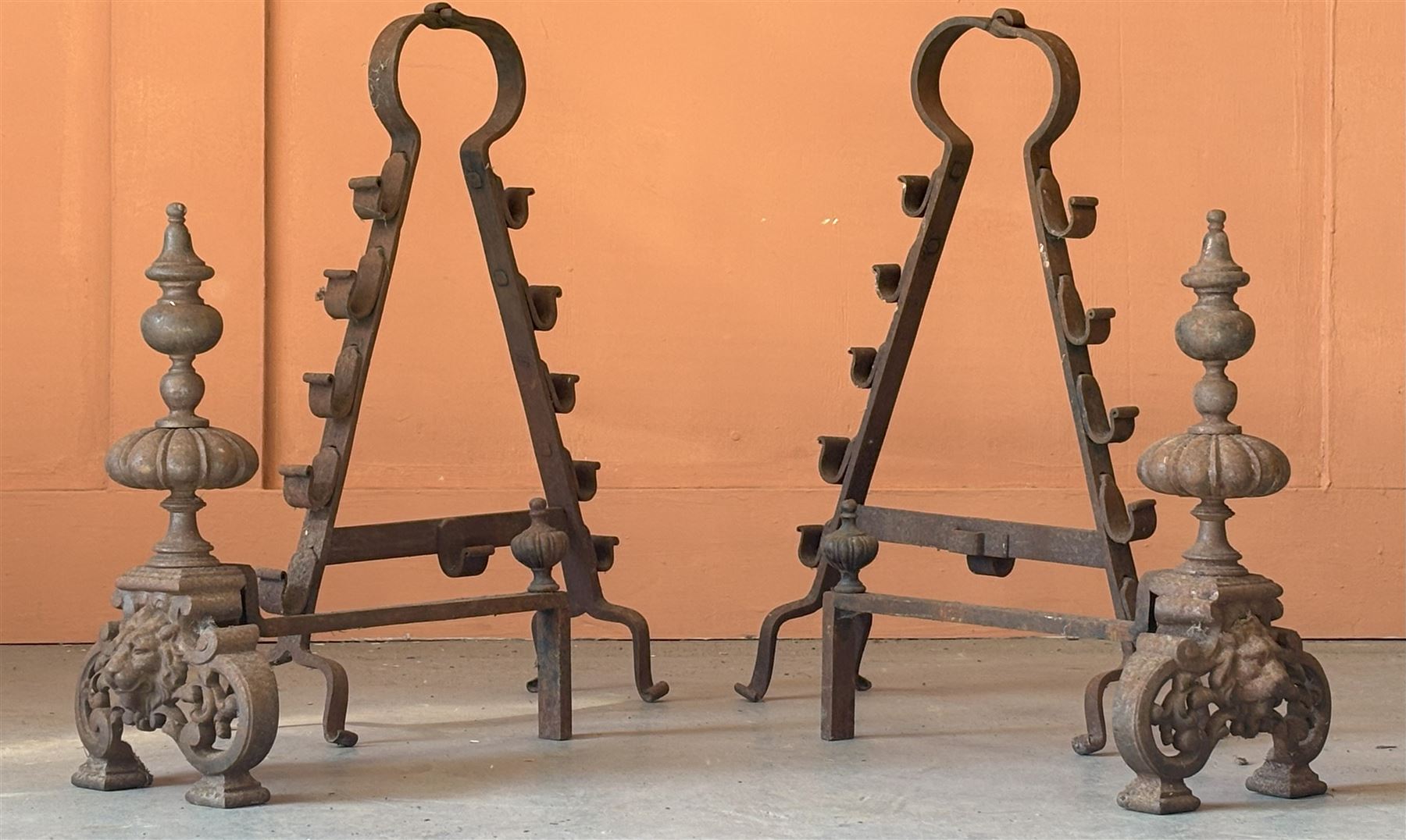 Pair of Dutch cast iron fire dogs with lion mask motif (H42cm) together with a 19th century wrought iron spit rack (H60cm)  - COLLECTION BY APPOINTMENT FROM: The White House, Thirsk Road, Easingwold, York, YO61 3NF - CALL 01723 507111 TO ARRANGE