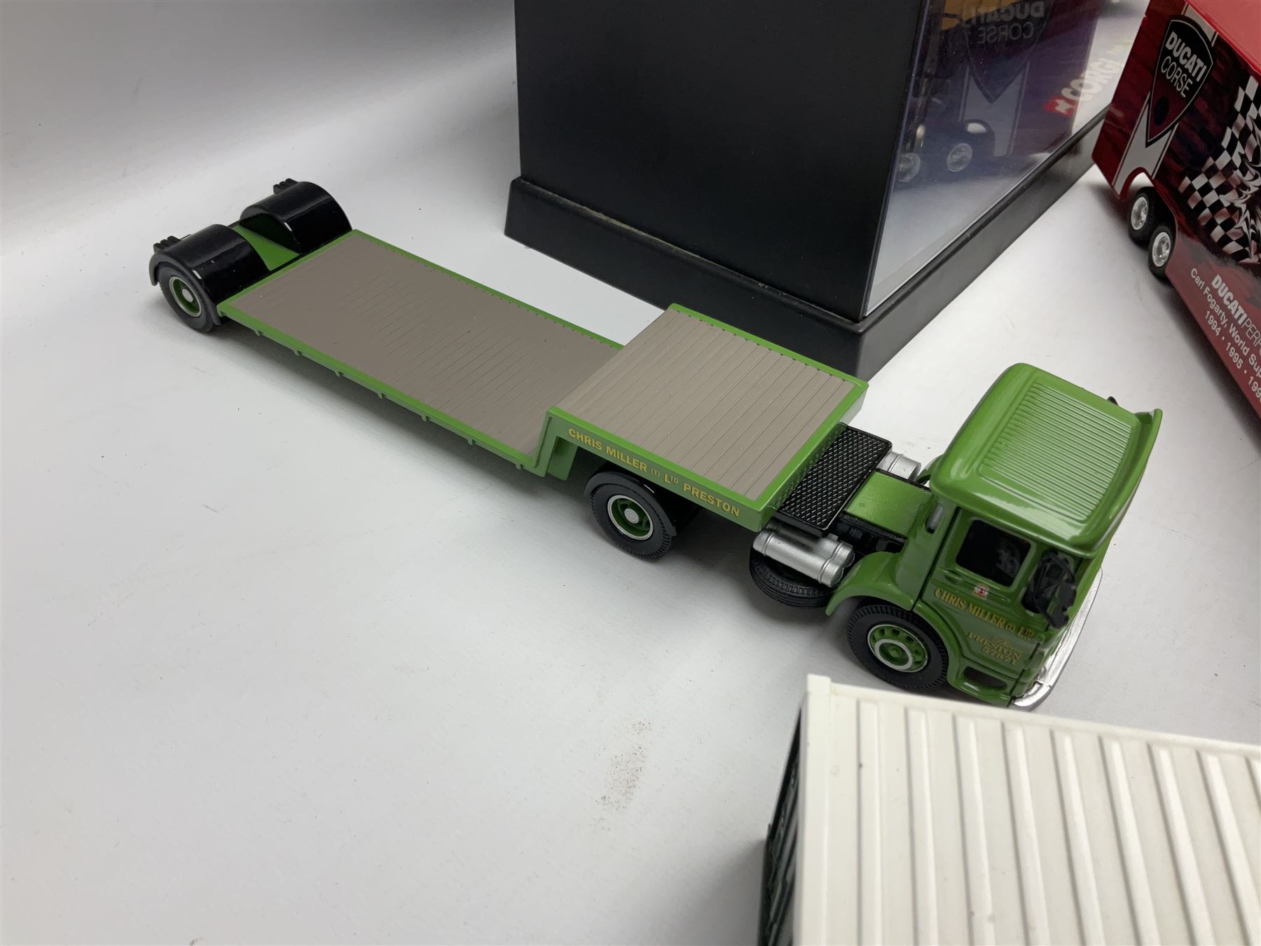 Corgi - two perspex cased 'Modern Trucks; 75202 ERF Curtainside Boddingtons and 75402 Leyland-DAF Curtainside Tate & Lyle; and nine unboxed Corgi lorries (11)