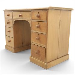 20th century ash twin pedestal desk, gadroon galleried top, twin bank of graduated drawers, plinth base