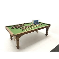Edwardian 'E.J.Riley LTD' oak framed slate bed billiard table, with dining table leaves, green baize, four square tapering fluted supports, with accessories including ball set, cues, scoreboards, W120cm, H74cm, L225cm