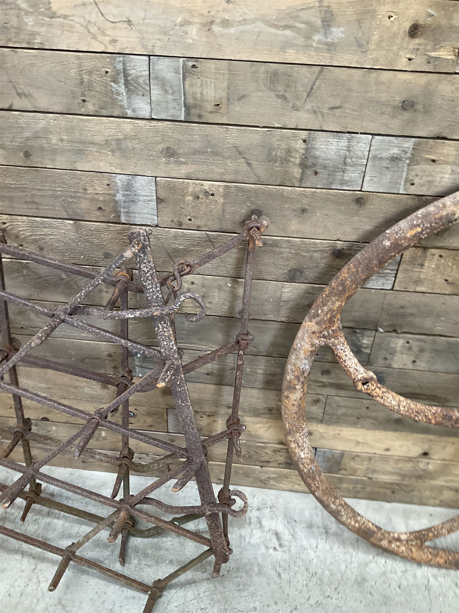 Two vintage agricultural harrows and cast iron machinery wheel/gear