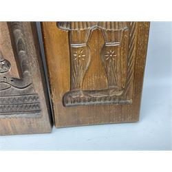 Six 20th century hardwood Dutch folk art Speculaasplank or biscuit moulds, typically carved with figures in traditional dress, largest H101cm