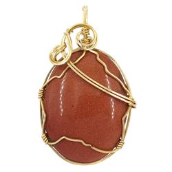 9ct gold wire goldstone pendant