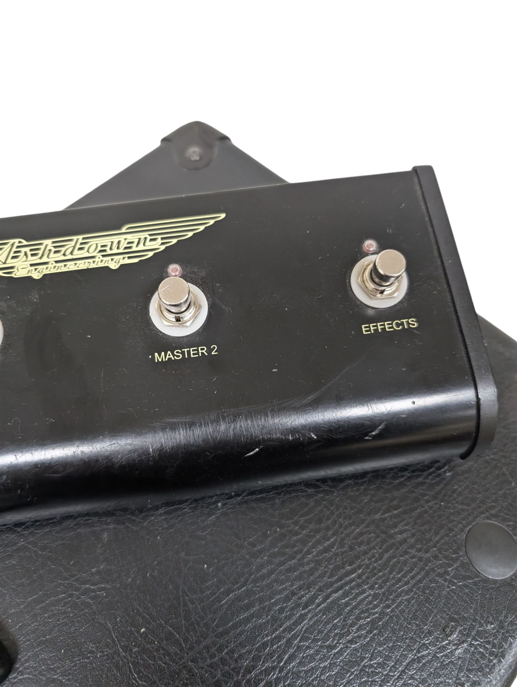 Ashdown Engineering Fallen Angel 60 DSP guitar amplifier head model no. FA60H, serial no. 18930406, 4 x 12 speaker cabinet, model no. FA 412A serial no. 20210106, and a four-button foot pedal, head H24cm, W70cm, cab H78cm, W70cm