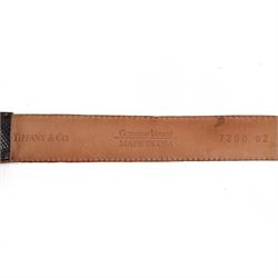 Tiffany & Co. brown lizard leather belt, stamped Tiffany & Co., Genuine Lizard, Made in USA, fitted with an Hermes style gold-tone H-shaped buckle, belt length 123cm