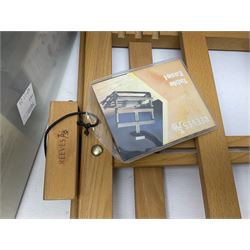 Chatsworth box easel, together with a Reeves table easel, collection of Wentworth jigsaw puzzles and two picnic baskets