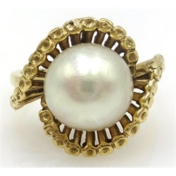  Pearl gold ring, in open scroll setting tested to 9ct  
