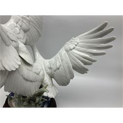 Large Lladro figure group, Swans Take Flight, modelled as two swans upon raised on circular wooden plinth, sculpted by Salvador Debon, H68cm