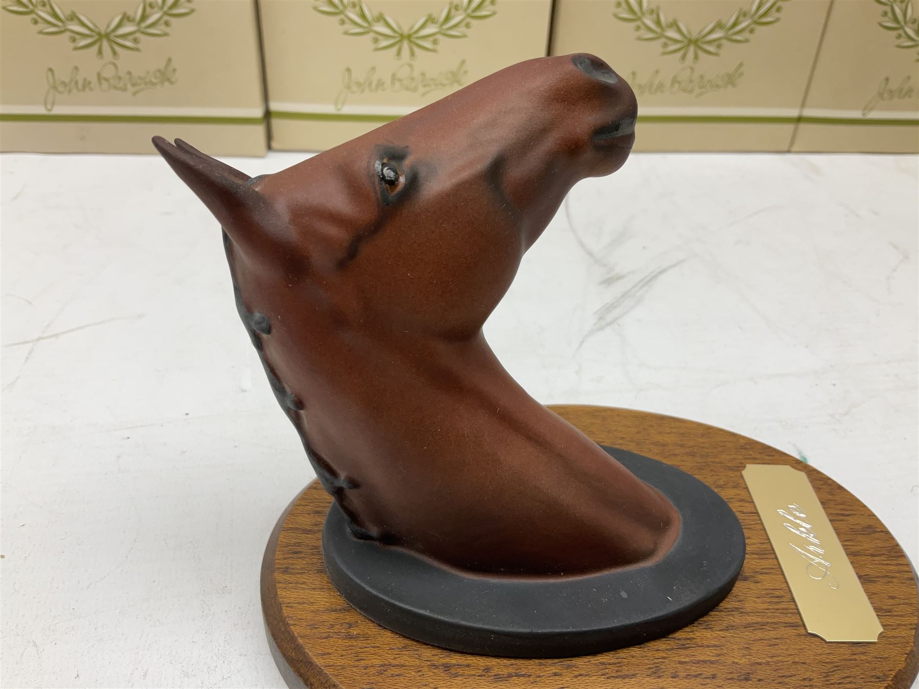 Beswick set of horse head wall plaques 'Champions all', comprising Arkle no.2700, The Minstrel no.2701, Red Rum no.2702, Troy no.2699, all with original boxes