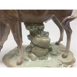 Lladro figure, Antelope Drinking, modelled as antelope in a naturalistic setting, sculpted by Vincente Martinez, with original box, no 5302, year issued 1985, year retired 1988, H18cm