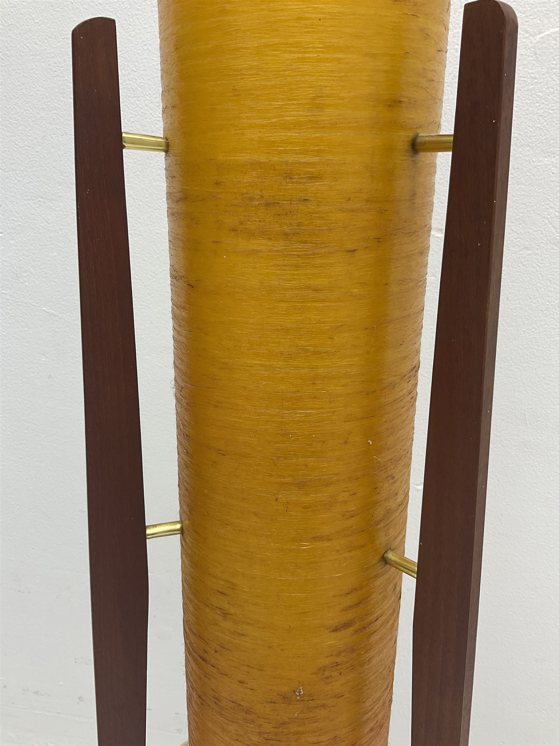 Mid century floor standing rocket lamp, the spun cylindrical orange fibreglass shade supported by three tapering teak legs, together with a matching small cylindrical shade, lamp H112cm