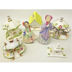  Three Royal Doulton figures 'The Little Mistress' potted by Doulton HN 1449 and 'Babie' HN1679 and five Coalport house models The Gingerbread House, Temple House, The Parasol House, The Umbrella House and Keepers Cottage (8)  