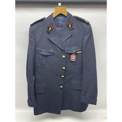 Mid 20th century French Ugeco Nantes first class dress navy blue uniform with ribbon bar with cap, and quantity of Sapeurs Pompiers patches, Sapeurs Pompiers de Caen belt buckle etc