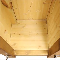 Indigo Furniture - rustic oak triple wardrobe, fitted with three doors with wrought metal fittings and locks, on style supports