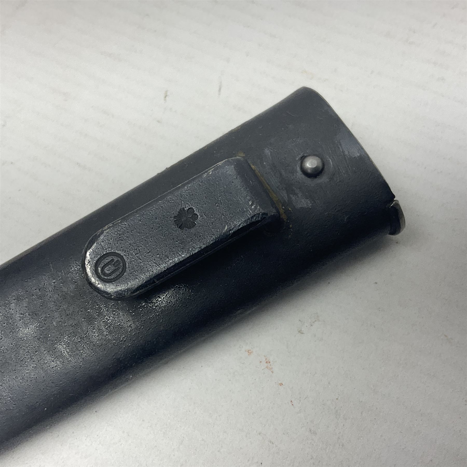 Austrian Model 1895 Carbine knife bayonet with 24.5cm fullered steel blade; various marks to the ricasso including F.G. GY.; cross-piece marked No.7843; in steel scabbard L37cm overall