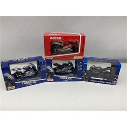 Fifty-one die-cast models of motorcycles by Maisto, Protar Italeri, Welly etc; many in perspex display boxes, some in window boxes and some unboxed