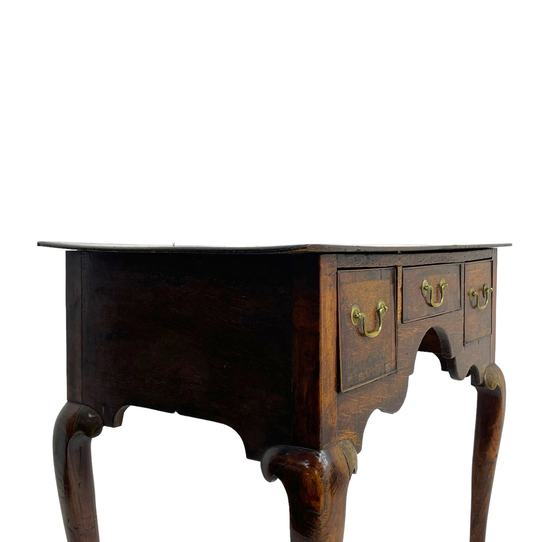 18th century oak low-boy, rectangular top over three crossbanded and cock-beaded drawers, ogee and stepped arch apron, on cabriole supports 