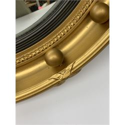 A vintage Atsonea convex mirror, of circular form with gilt frame, D41.5cm. 
