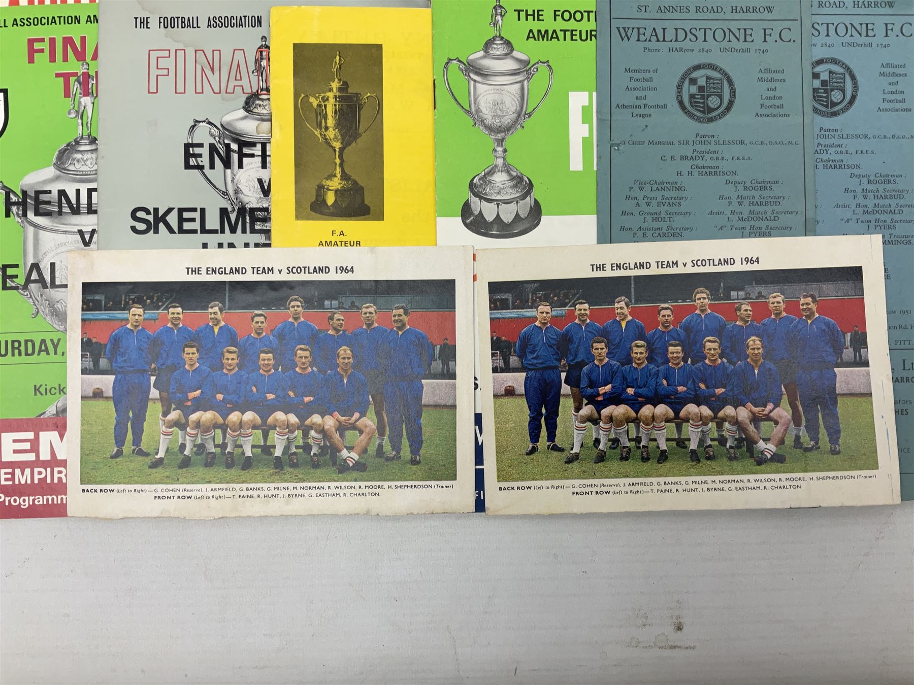 Football programmes - thirteen various England and England Youth matches 1953-77; European Cup Winners Cup Final May 19th 1965 TSV Munchen 1860 v West Ham; European Champions Club Cup Final May 29th 1968 Benfica (1) v Manchester United (4), the famous Bobby Charlton final; seven Wealdstone F.C. 1950-66 including London Senior Charity Cup Final May 10th 1952; Harrow Town Football Challenge Cup April 14th 1948; and eight F.A. Amateur Cup Finals and Semi-Finals plus three song sheets 1956-68 (34)