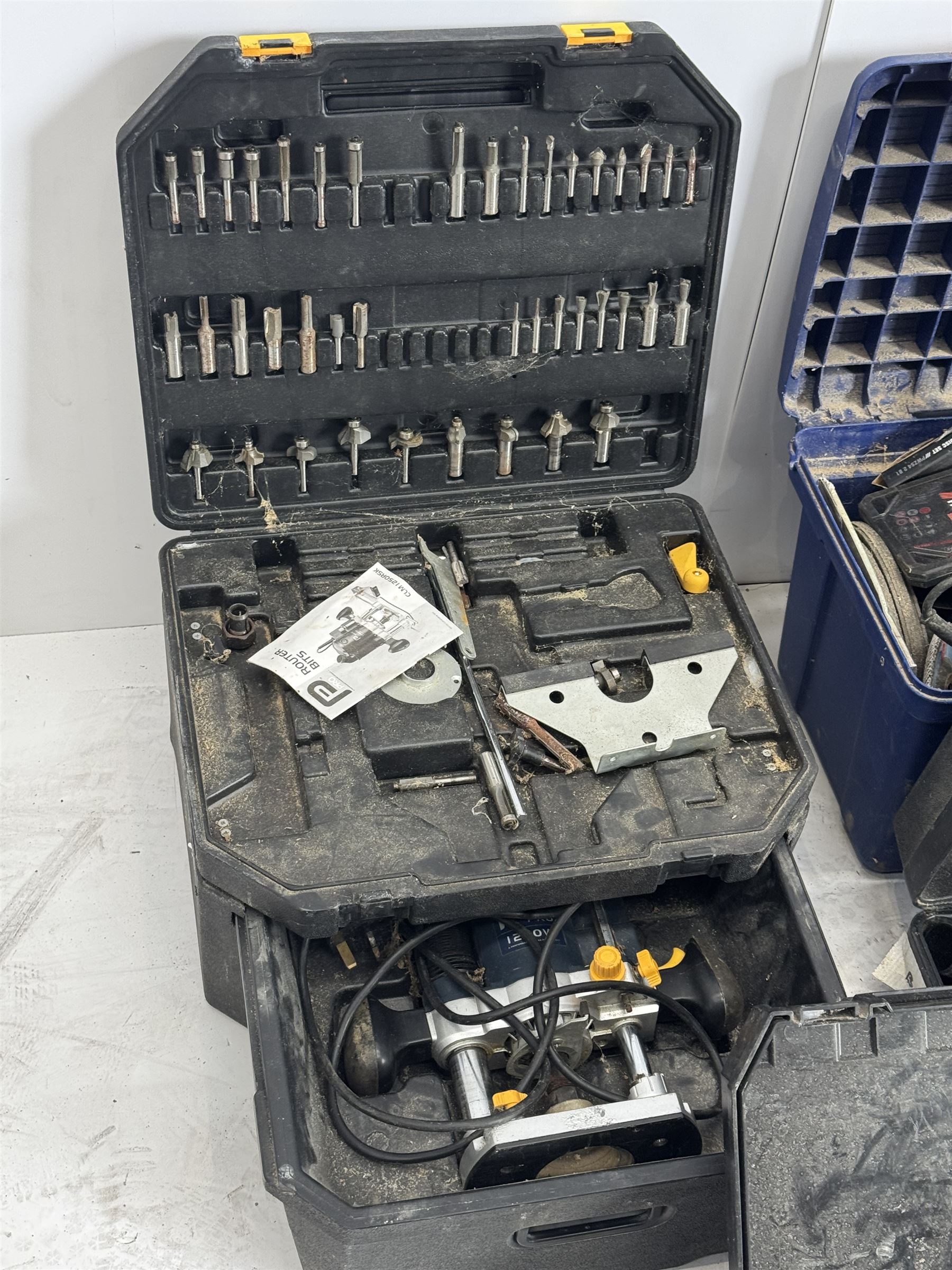 Performance Pro router with accessories, cased; DeWalt drill, two angle grinders with bits, biscuit jointer, bench grinder, scroll saw, heat gun, drills and other