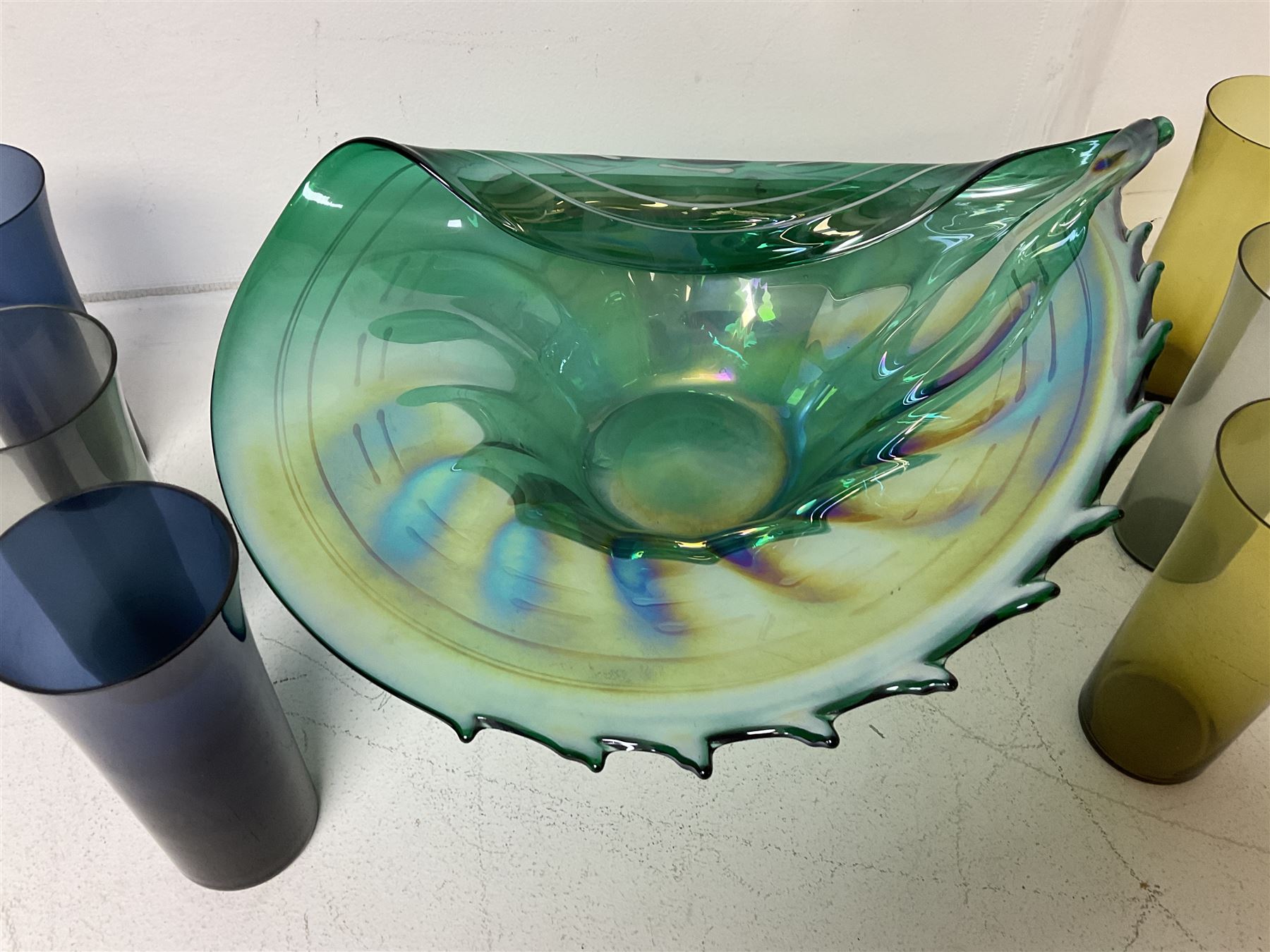 Large green studio glass conch shell bowl, with lustre finish, together with six coloured glasses, bowl W44cm