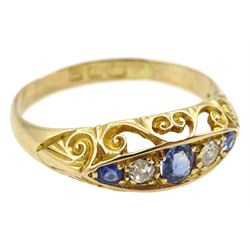 Edwardian 18ct gold three stone sapphire and two stone diamond ring, Birmingham 1907