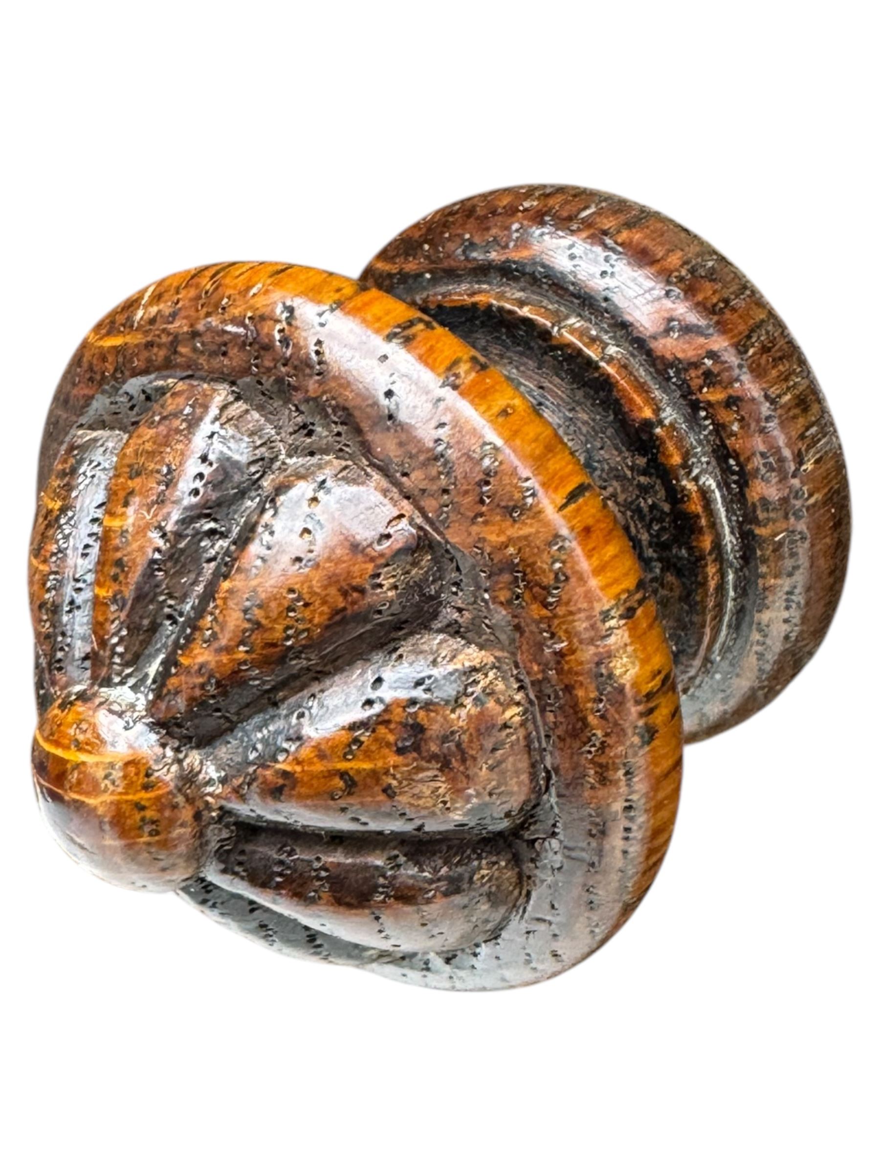 Early 20th century Jacobean design oak desk, with rectangular top inset with worn tooled leather, two frieze drawers over pedestals each fitted with a pair of panelled drawers, turned handles, on carved and fluted tapering legs united by stretchers 