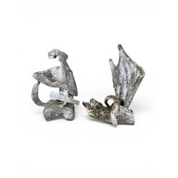 Composite stone sculptured figure playing a guitar, and a shell sculpture (2)