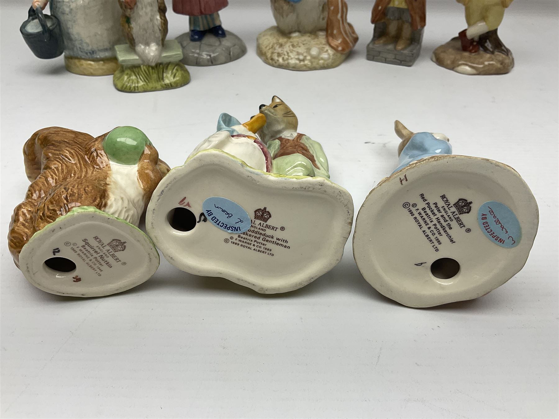 Sixteen Royal Albert Beatrix Potter figures, including Poorly Peter Rabbit, Jemima Puddle Duck and Squirrel Nutkin etc, all boxed together with a Beswick Beatrix Potter Jeremy Fisher miniature jug and four Beswick Wind in the Willows figures 