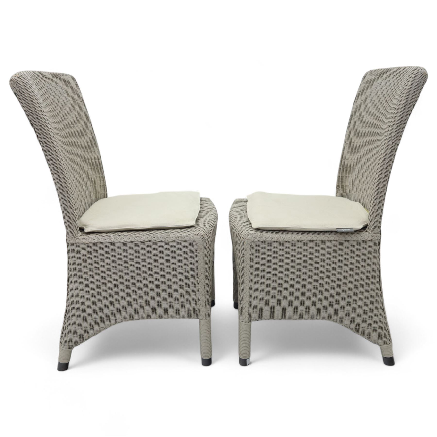 Neptune – Sheldrake limed oak extendable dining table and eight Havan loom chairs, the oval top in limed oak finish with four additional leaves extending the table to seat up to ten (Extends to cm), raised on turned legs with two additional centre supports, the matching Havan loom chairs finished in grey with cream upholstered seat covers (H 95cm, W 47cm, D 55cm)